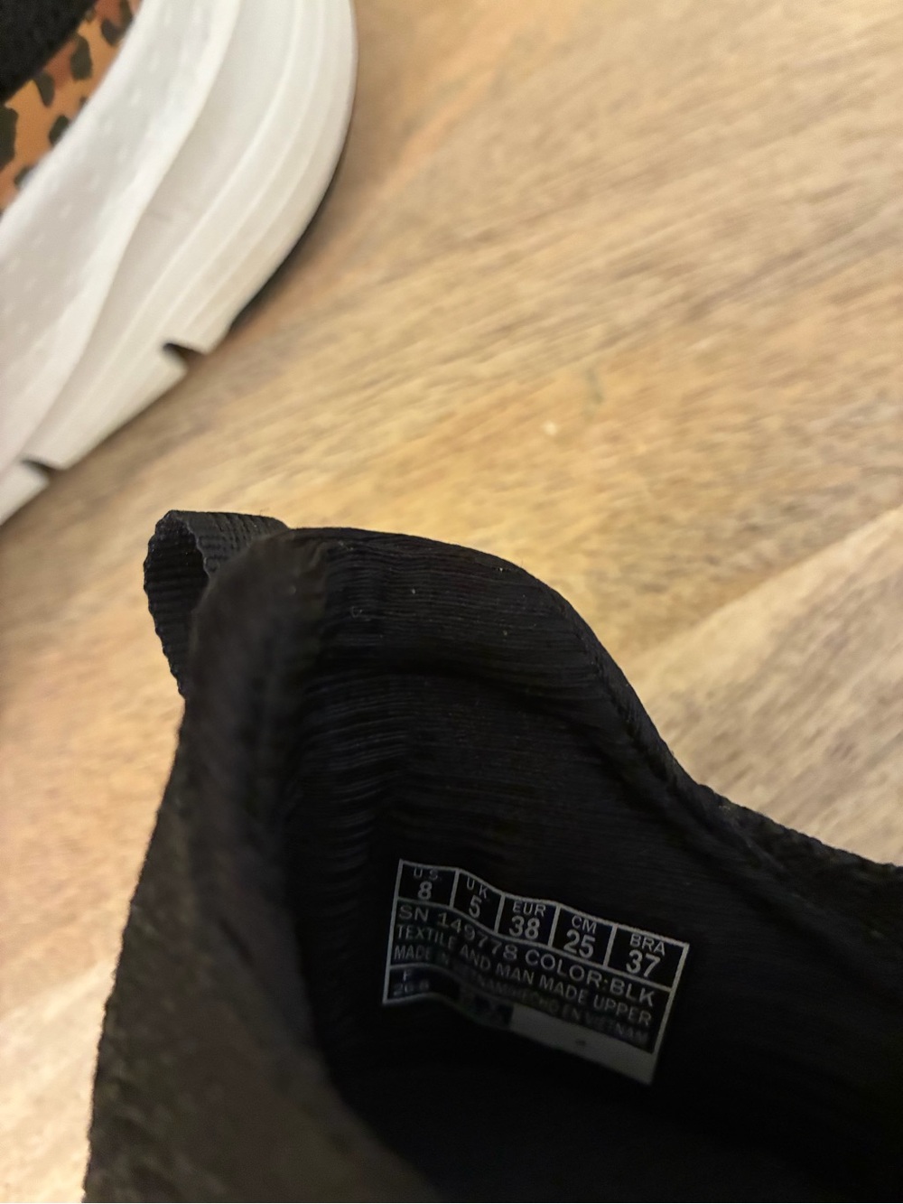 Skechers Black Slip-On Arch Fit Sneakers with Leopard Print Accent - Picture 5 of 5
